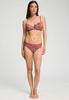 Full-body view of a women model wearing HA apple butter microfibre Midi Briefs