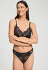 Front view of a women model wearing HA black microfibre Soft Cup Bra