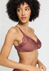 Close-up view of a women model wearing HA apple butter microfibre Soft Cup Bra