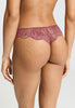 Back view of a women model wearing HA apple butter microfibre Thong