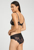 Back view of a women model wearing HA black microfibre U/wire Bra