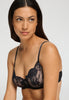 Close-up view of a women model wearing HA black microfibre U/wire Bra