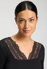 Close-up view of a women model wearing HA phantom wool L/SLV Shirt