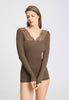 Front view of a women model wearing HA natural teak wool L/SLV Shirt