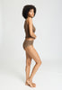 Full-body view of a women model wearing HA natural teak wool Maxi Briefs