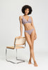 Full-body view of a women model wearing HA stormy rose microfibre Thong
