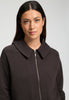 Close-up view of a women model wearing HA dark mocha cotton Cardigan