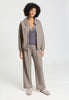 Full-body view of a women model wearing HA rose grey cotton Cardigan