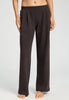 Front view of a women model wearing HA dark mocha cotton Long Pants