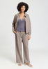 Full-body view of a women model wearing HA rose grey cotton Long Pants