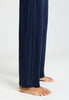 Close-up view of a women model wearing HA deep navy cotton L/SLV Pajama