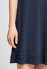 Close-up view of a women model wearing HA deep navy cotton S/SLV Nightdress 95cm