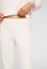Close-up view of a women model wearing HA off white cotton L/SLV Pajama