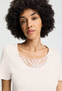Close-up view of a women model wearing HA off white cotton S/SLV Nightdress 100cm