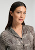 Close-up view of a women model wearing HA calm systems modal/viscose/tencel L/SLV Shirt