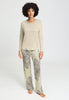 Full-body view of a women model wearing HA creamy silk modal/viscose/tencel L/SLV Shirt