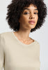 Close-up view of a women model wearing HA creamy silk modal/viscose/tencel L/SLV Shirt