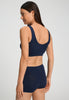 Back view of a women model wearing HA deep navy microfibre Crop Top