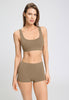 Front view of a women model wearing HA suede camel microfibre Crop Top