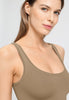 Close-up view of a women model wearing HA suede camel microfibre Crop Top