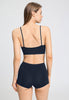 Back view of a women model wearing HA deep navy microfibre Crop Top