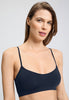 Close-up view of a women model wearing HA deep navy microfibre Crop Top