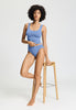 Full-body view of a women model wearing HA bluebird microfibre Tank Top