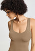 Close-up view of a women model wearing HA suede camel microfibre Tank Top