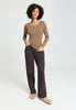 Full-body view of a women model wearing HA suede camel modal/viscose/tencel L/SLV Shirt