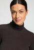 Close-up view of a women model wearing HA dark mocha modal/viscose/tencel Turtle-Neck Shirt