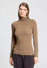 Front view of a women model wearing HA suede camel modal/viscose/tencel Turtle-Neck Shirt