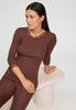 Close-up view of a women model wearing HA cinnamon wool 3/4 SLV Shirt