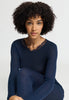 Close-up view of a women model wearing HA deep navy wool L/SLV Shirt