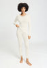 Full-body view of a women model wearing HA misty white wool L/SLV Shirt