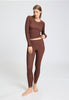 Full-body view of a women model wearing HA cinnamon wool L/SLV Shirt