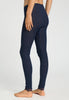 Back view of a women model wearing HA deep navy wool Leggings