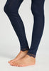 Close-up view of a women model wearing HA deep navy wool Leggings