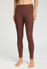 Front view of a women model wearing HA cinnamon wool Leggings