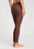 Back view of a women model wearing HA cinnamon wool Leggings