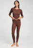 Full-body view of a women model wearing HA cinnamon wool Leggings