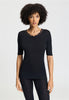 Front view of a women model wearing HA black wool S/SLV Shirt