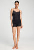 Full-body view of a women model wearing HA black wool Spaghetti Top