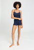 Full-body view of a women model wearing HA deep navy wool Spaghetti Top