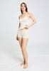 Full-body view of a women model wearing HA misty white wool Spaghetti Top