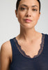 Close-up view of a women model wearing HA deep navy wool Tank Top
