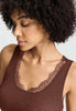Close-up view of a women model wearing HA cinnamon wool Tank Top