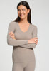 Front view of a women model wearing HA rose grey wool L/SLV Shirt