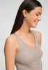 Close-up view of a women model wearing HA rose grey wool Tank Top