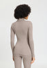 Back view of a women model wearing HA rose grey wool Turtle-Neck Shirt