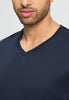 Close-up view of a men model wearing HA deep navy cotton L/SLV Pajama